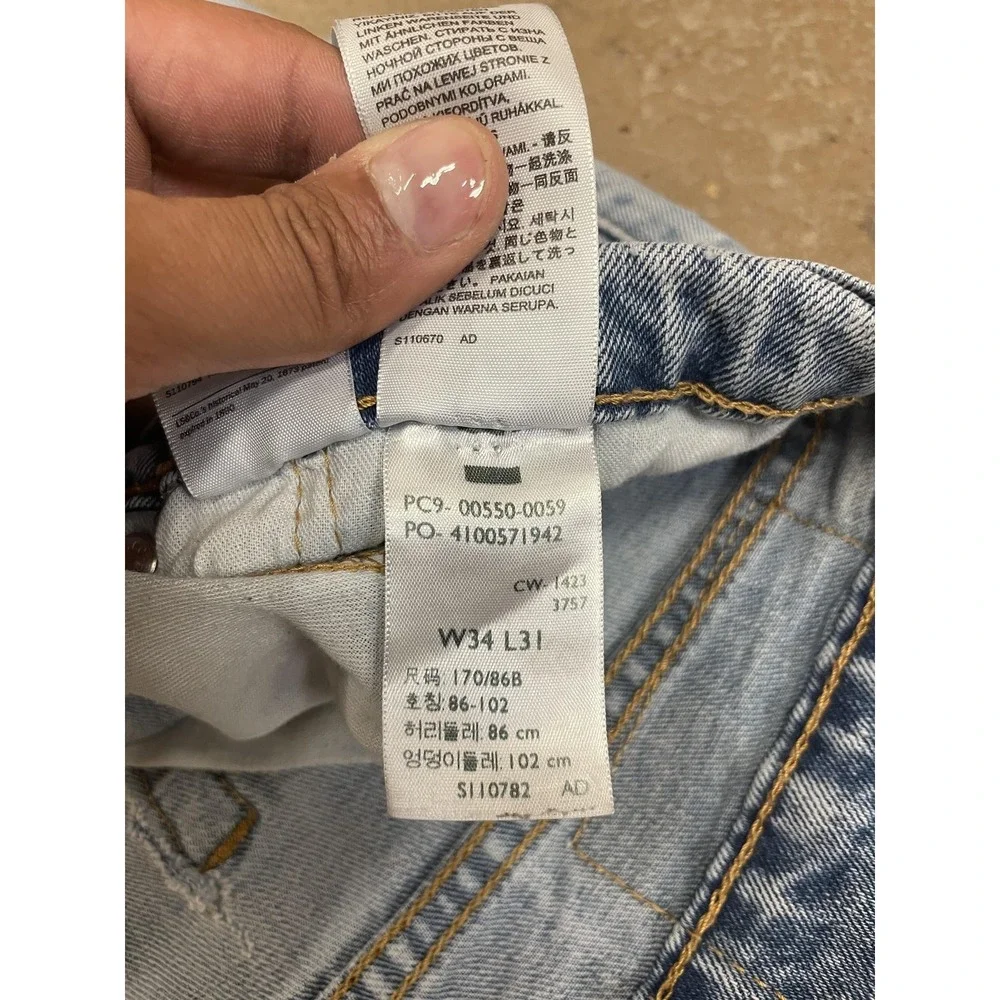 Levis 550 Jeans Mens 34x31 Light Wash Blue Relaxed Tapered Stretch Denim Zip Fly